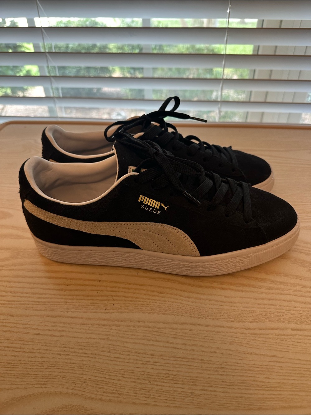 Puma Suede Low-Top Sneakers in Black and Cream